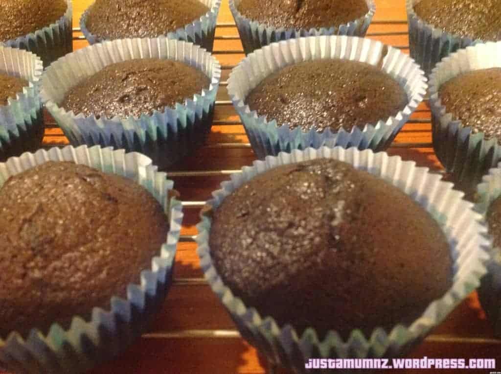 Easy Rich Chocolate Cupcakes not yet iced on an airing rack