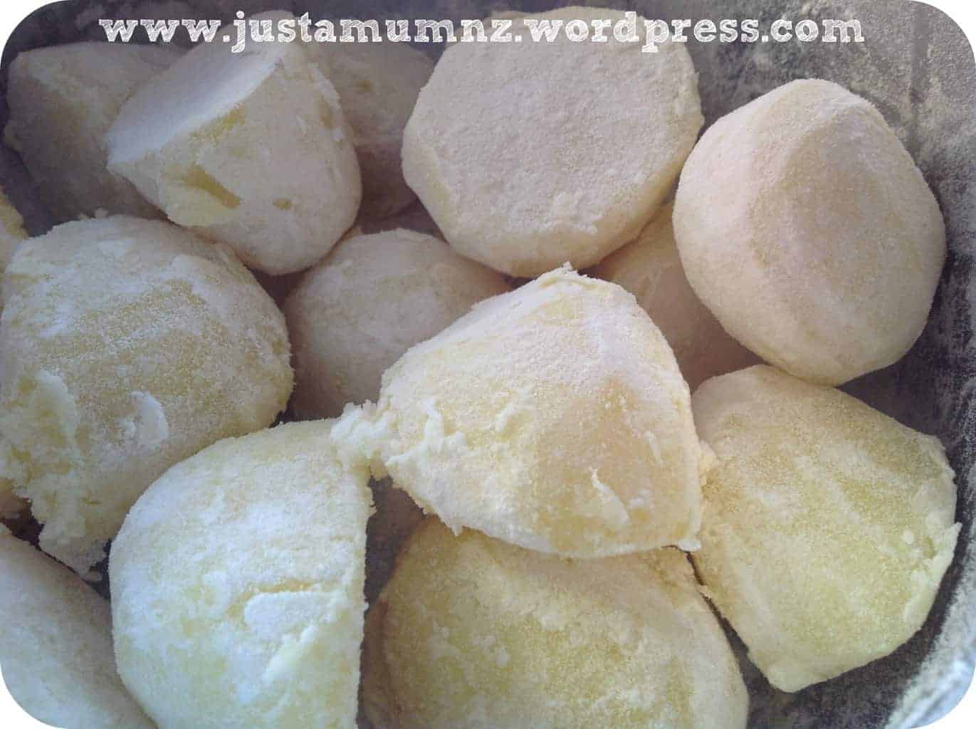 Toss the par baked potatoes into flour 