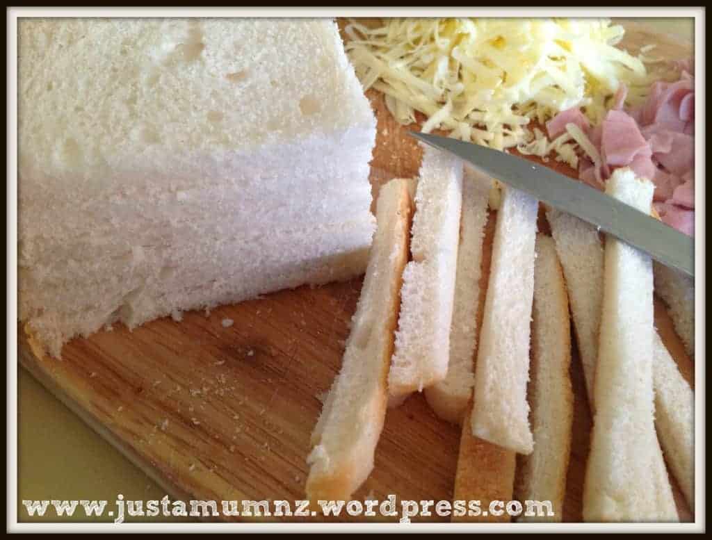 Cutting the crusts off the bread