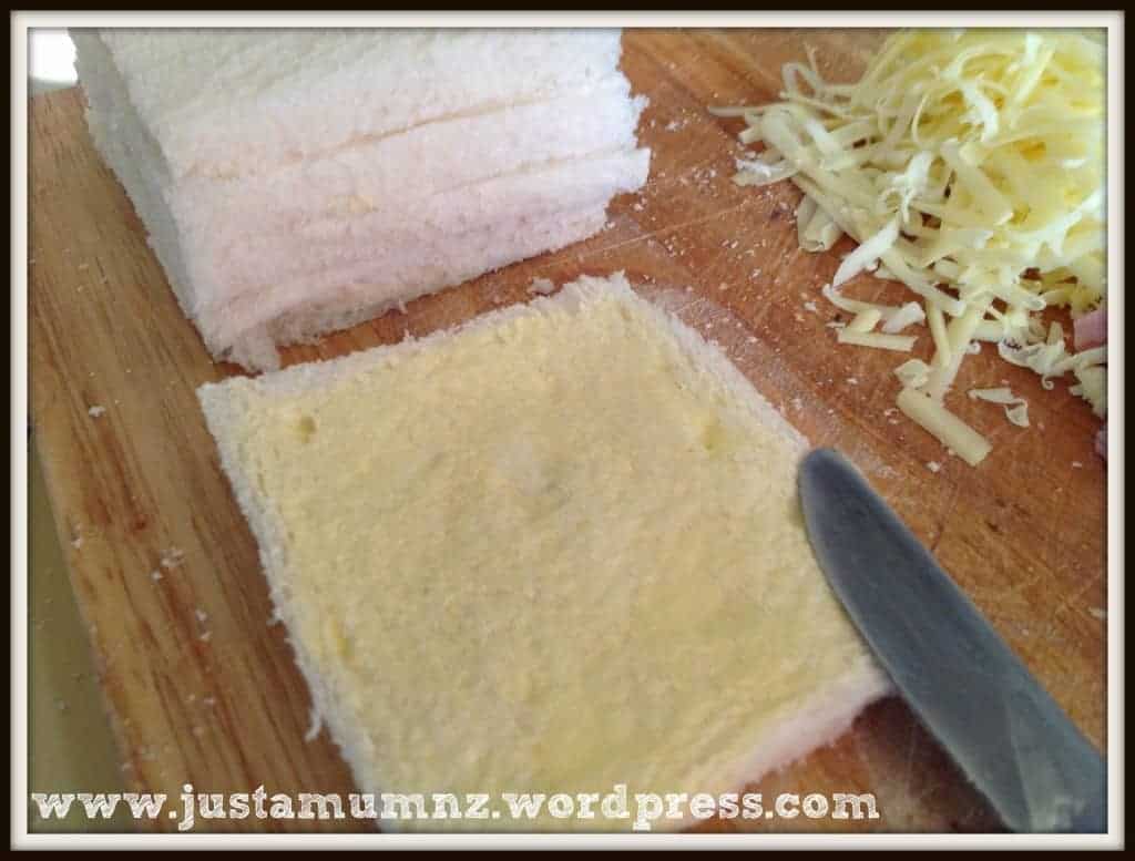 Cutting the crusts of the bread