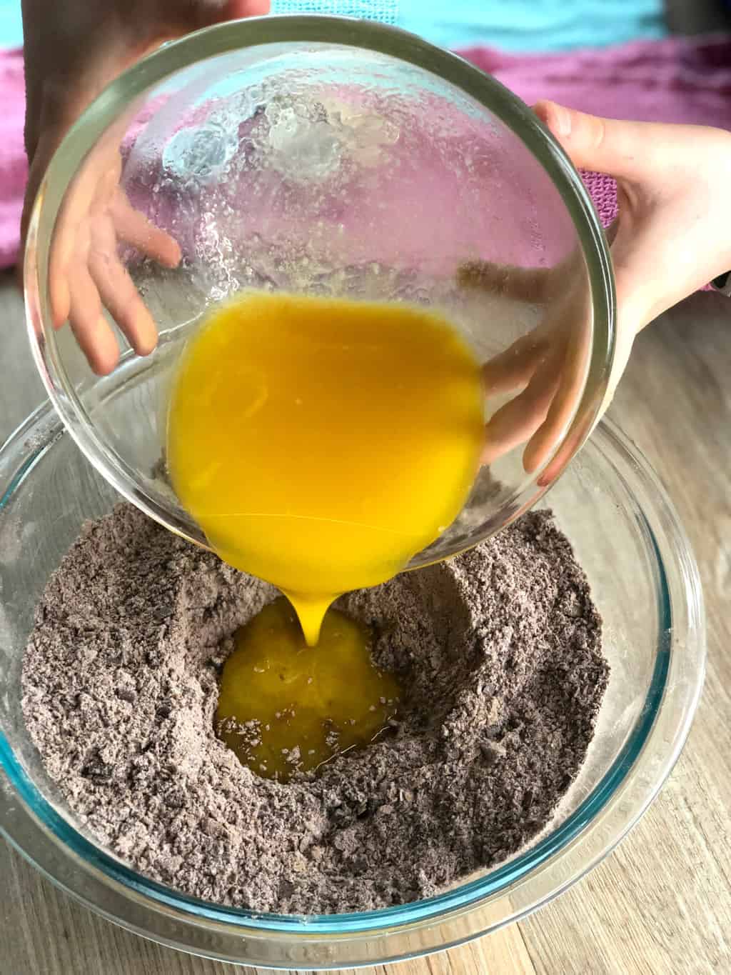 Child Baking with Mum, pouring melted butter