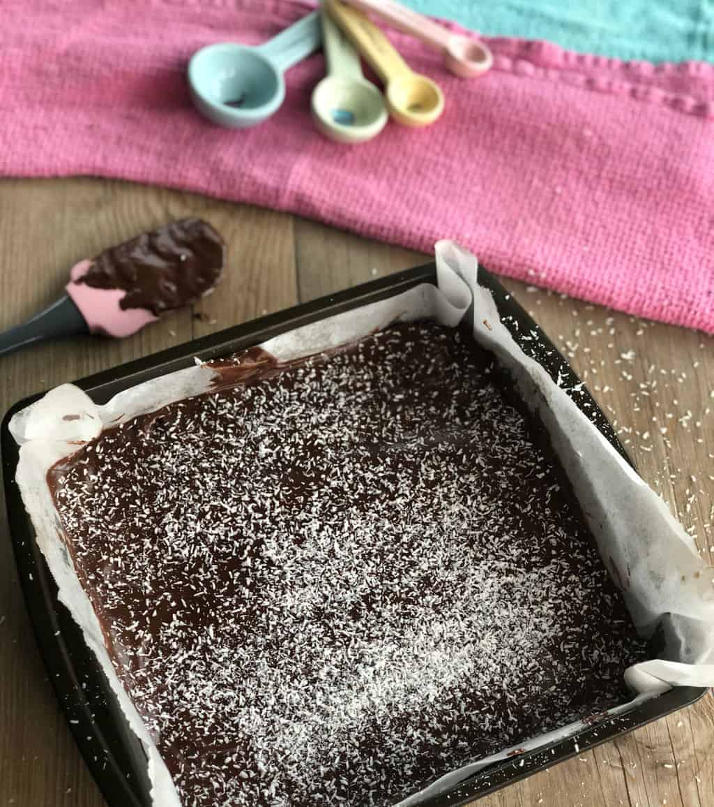 Slice ready to set, dusted in coconut