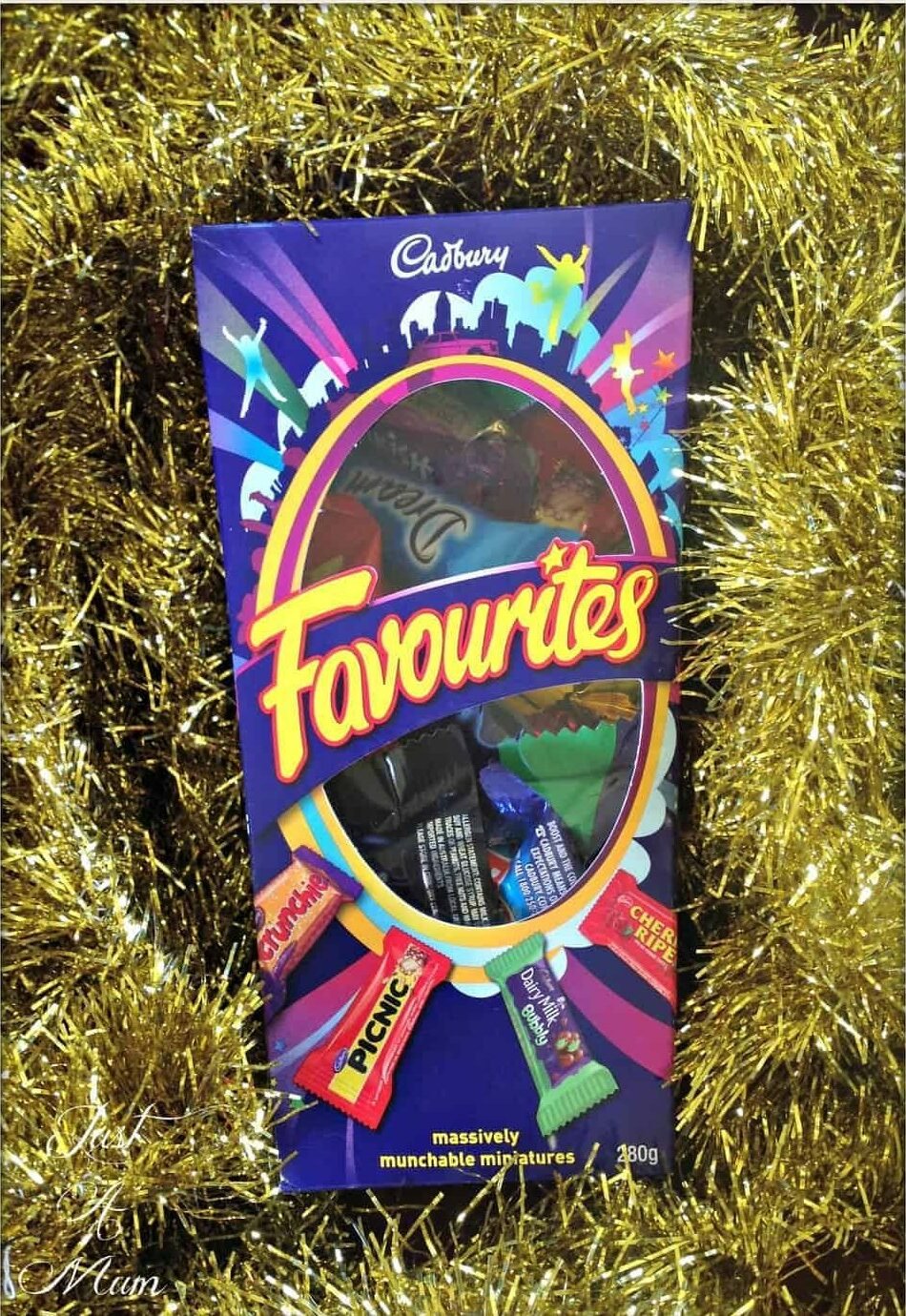 Cadbury favourites box wrapped in tinsel used to make chocolate brownie