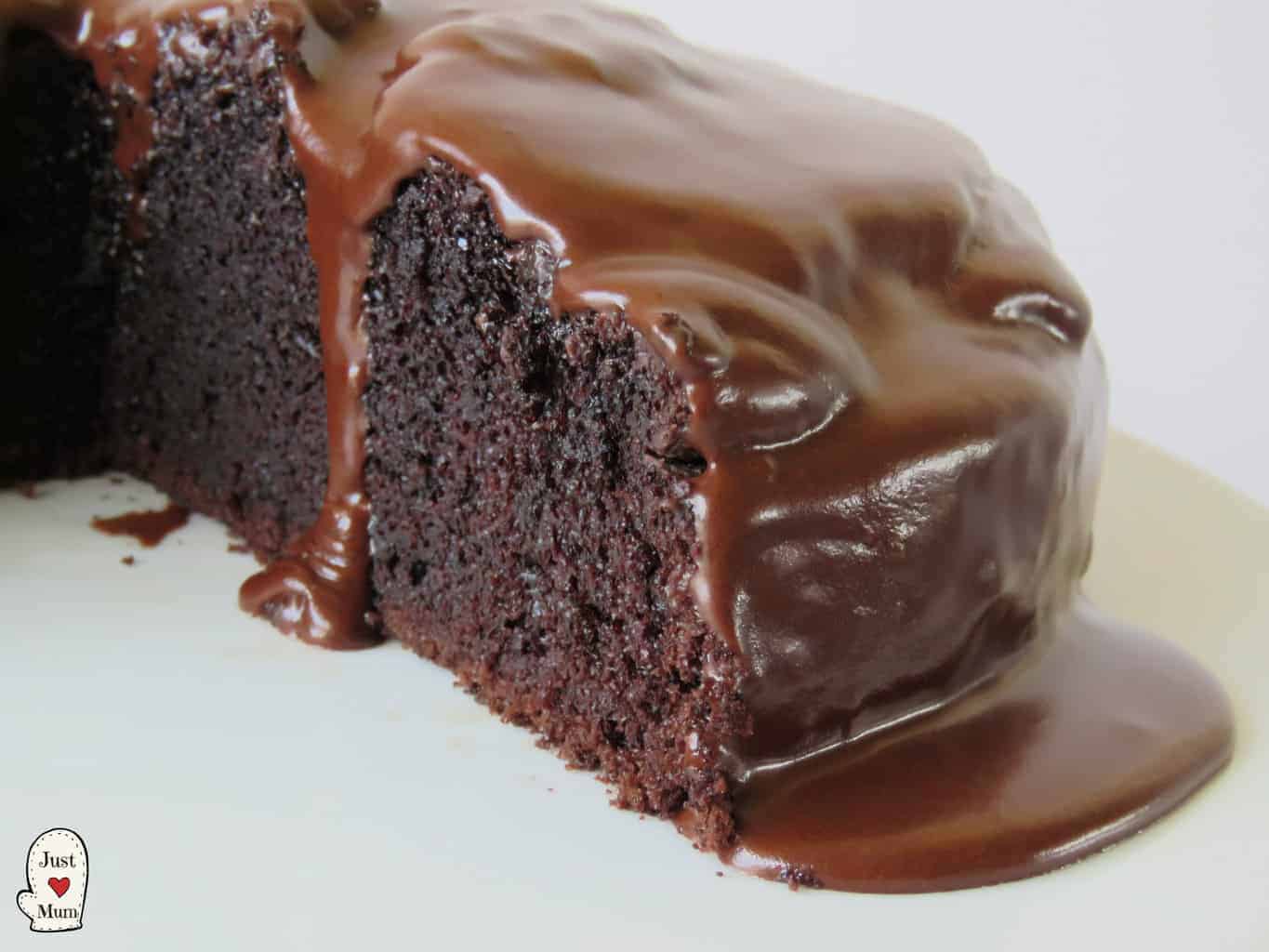 Thick Slice of Chocolate cake with icing dripping down