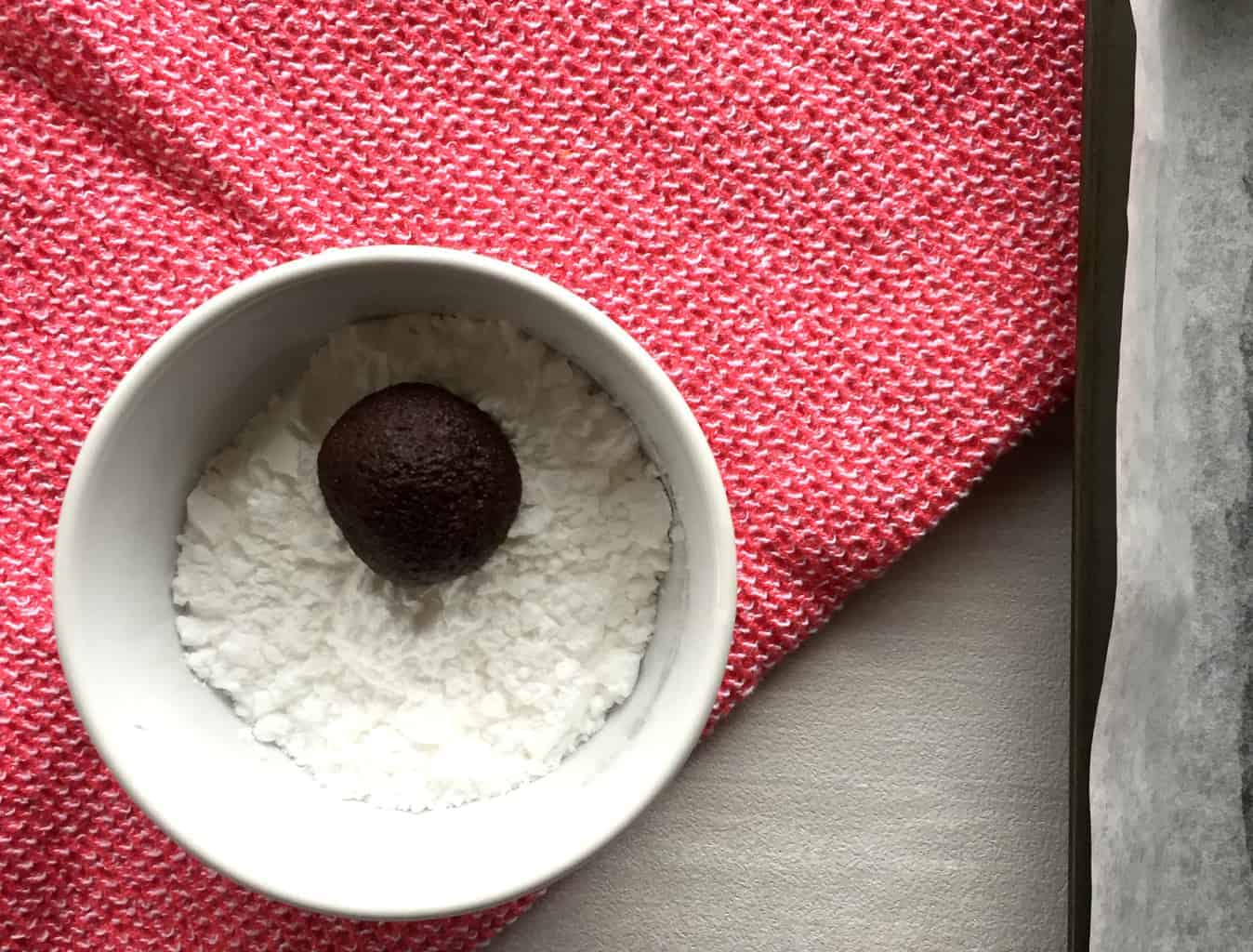 Just A Mums Chocolate Crackle Biscuits - small dough ball in icing sugar