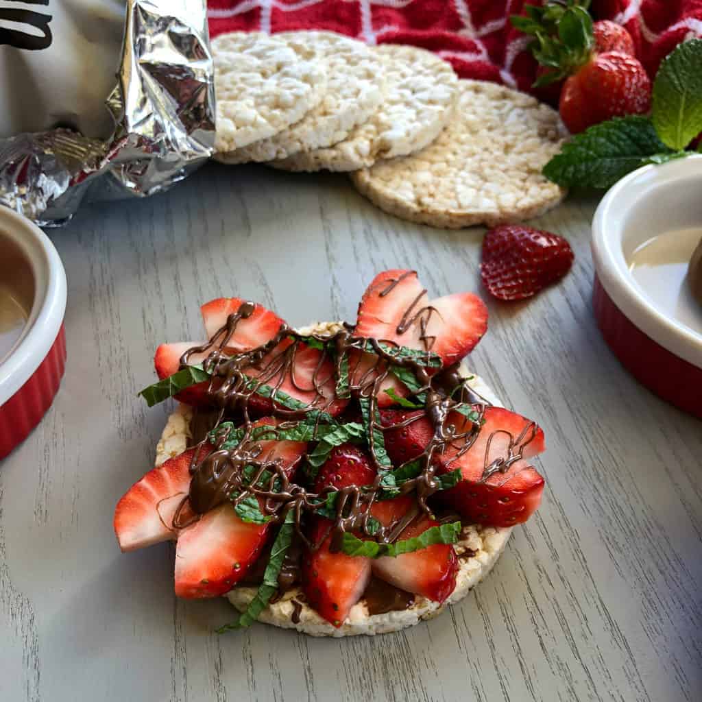 Just A Mum Rice Cake Toppings Nutella or Nutiva, mint, strawberries, 