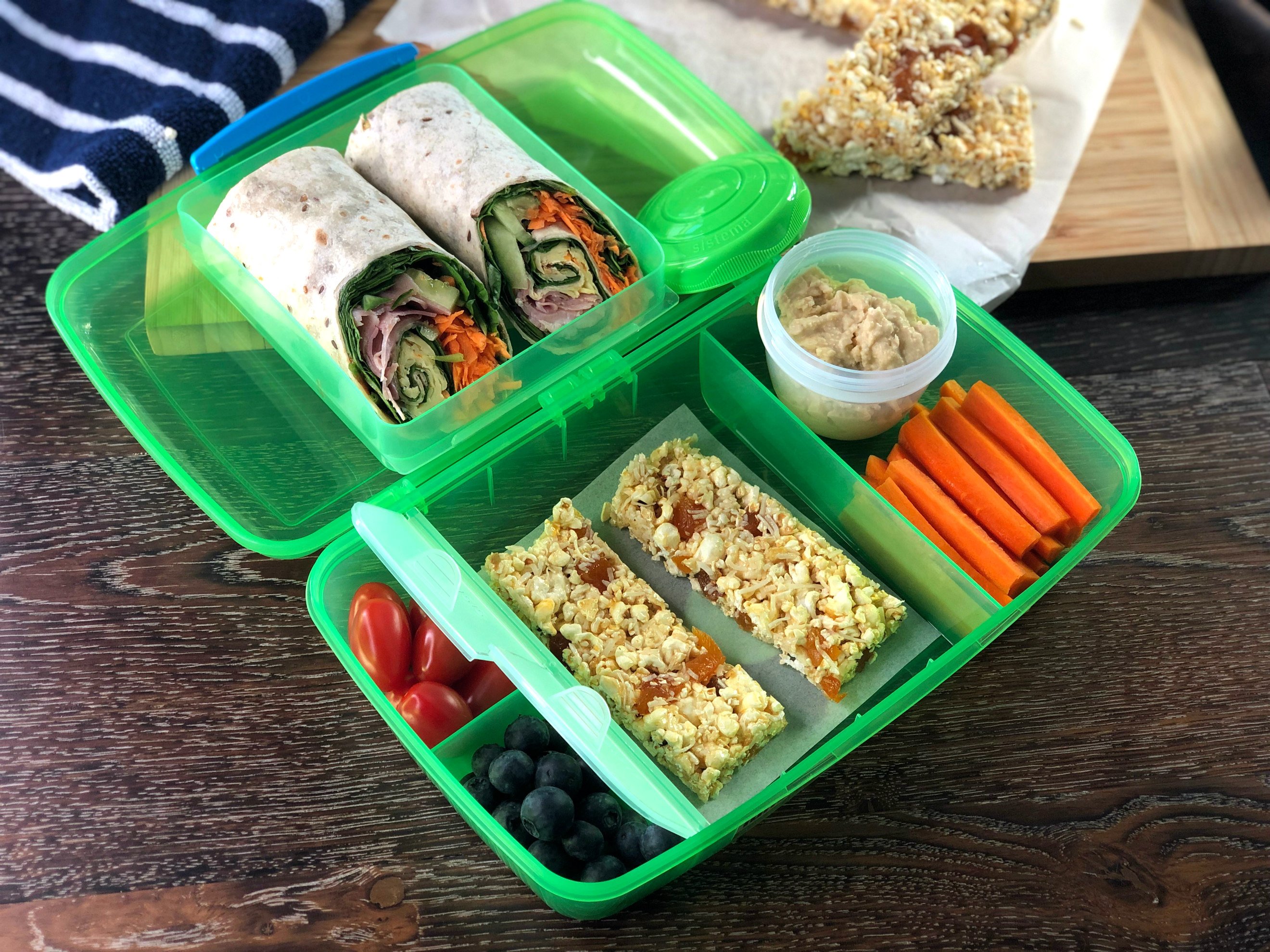 Just A Mum's Lunch Box, plastic free, nut free with Healthy Fillings, wrap, popcorn bars, vegetables and fruit