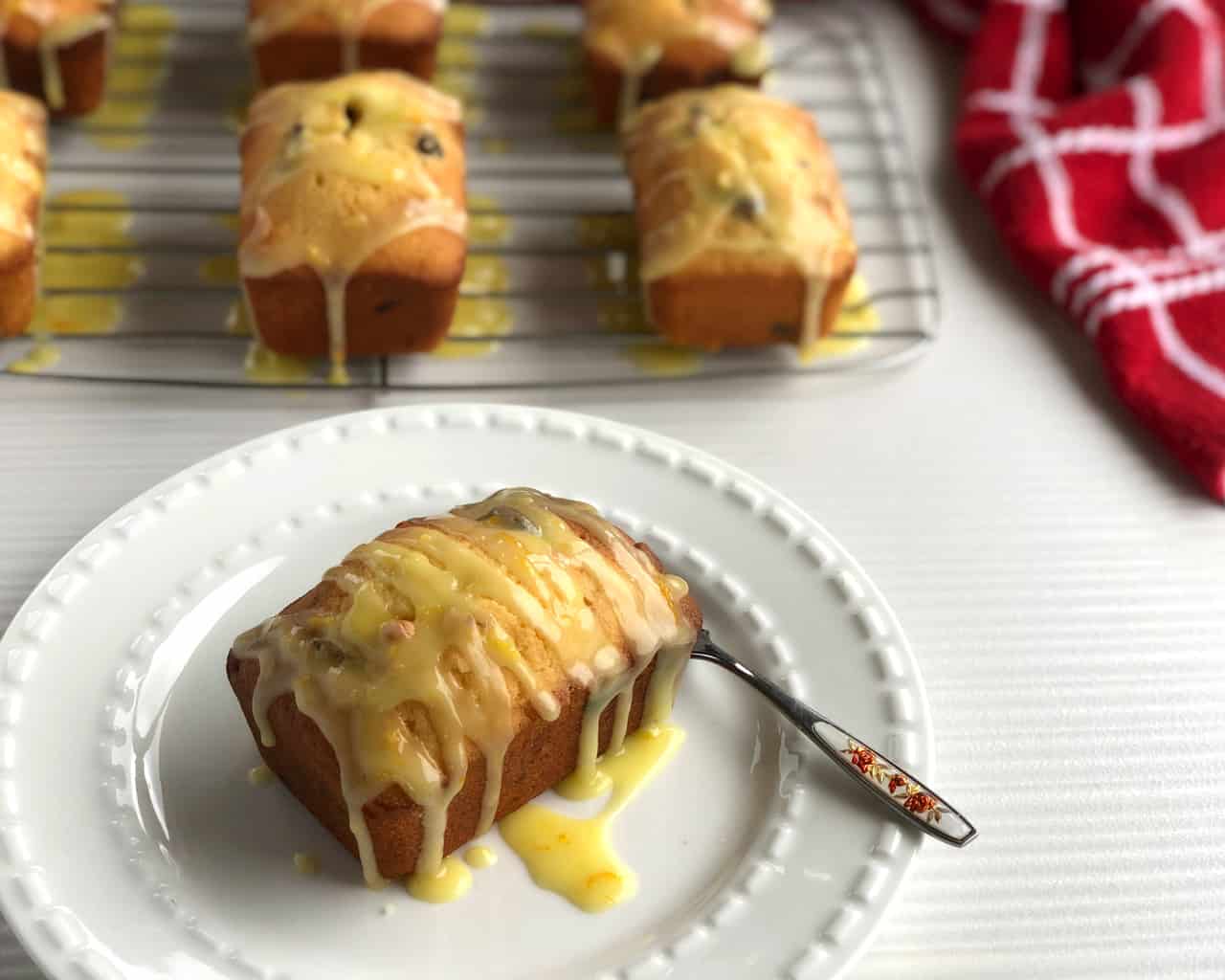 Sliced White Chocolate & Cranberry Loaf with Orange Icing Glaze Ready to Serve