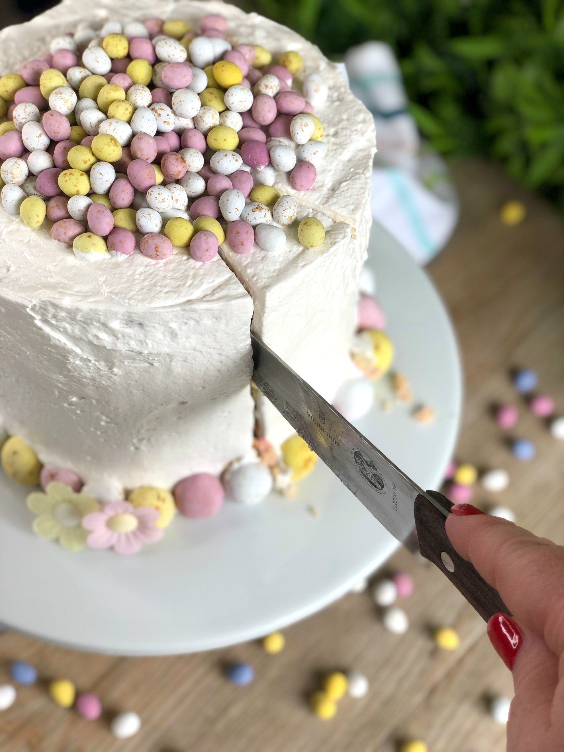 Cutting a Slice of Just a Mum's Easter Cake