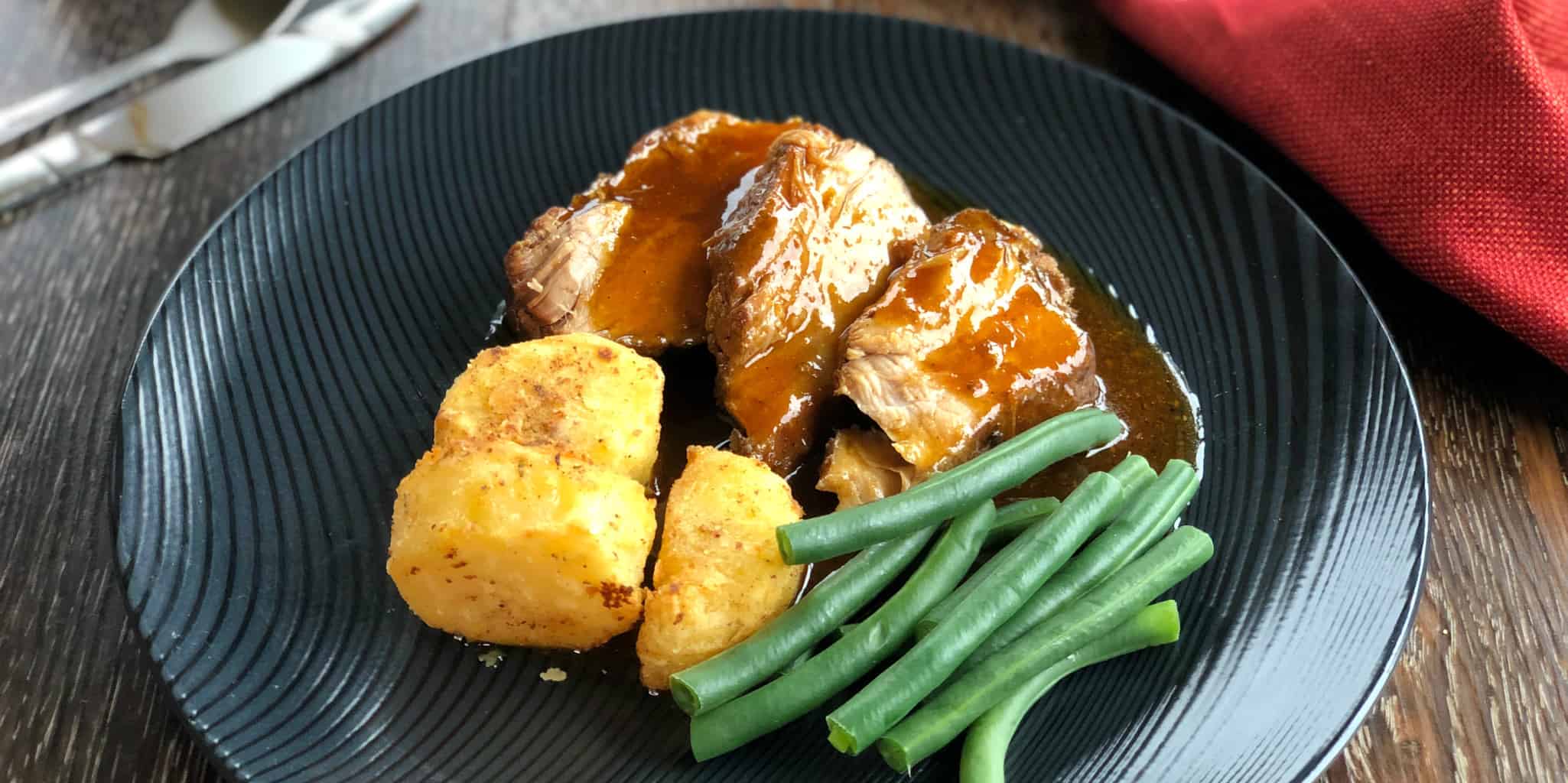 Delicious Perfect Roast Potatoes Served with Roast Pork