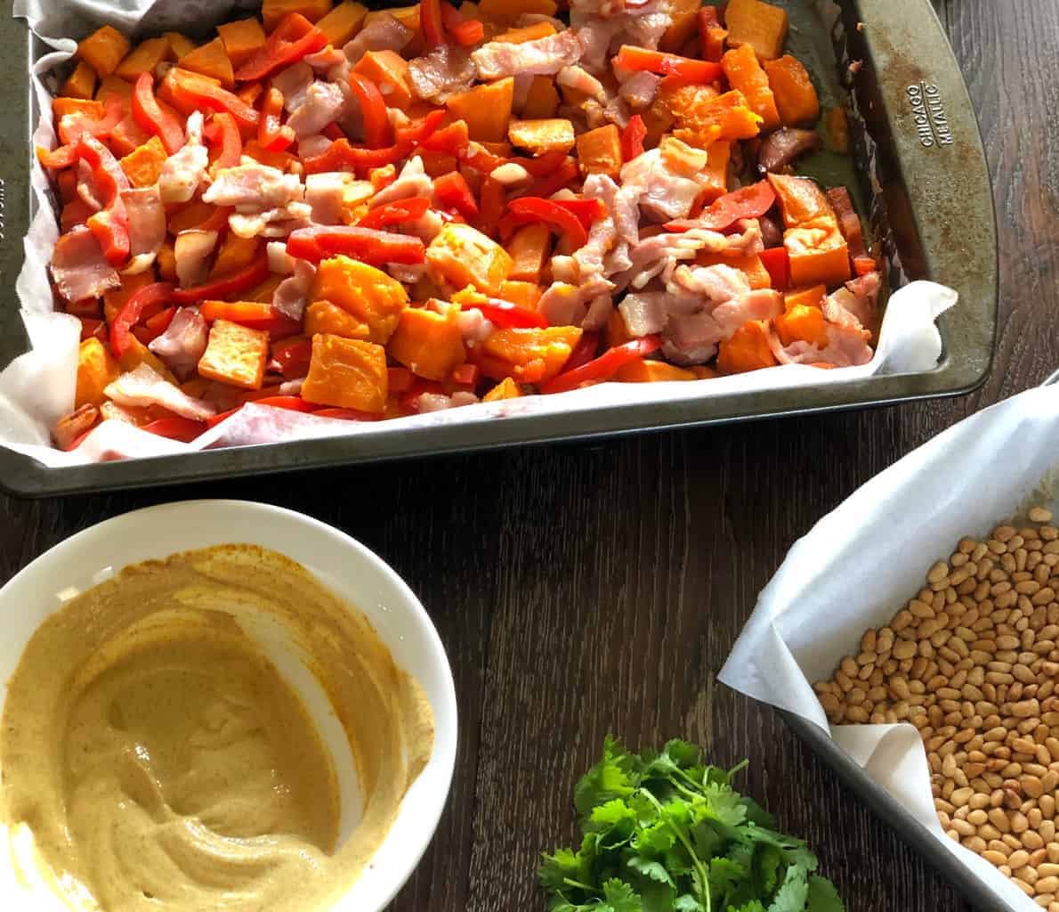 Final steps in making Kumara and Bacon Salad. 