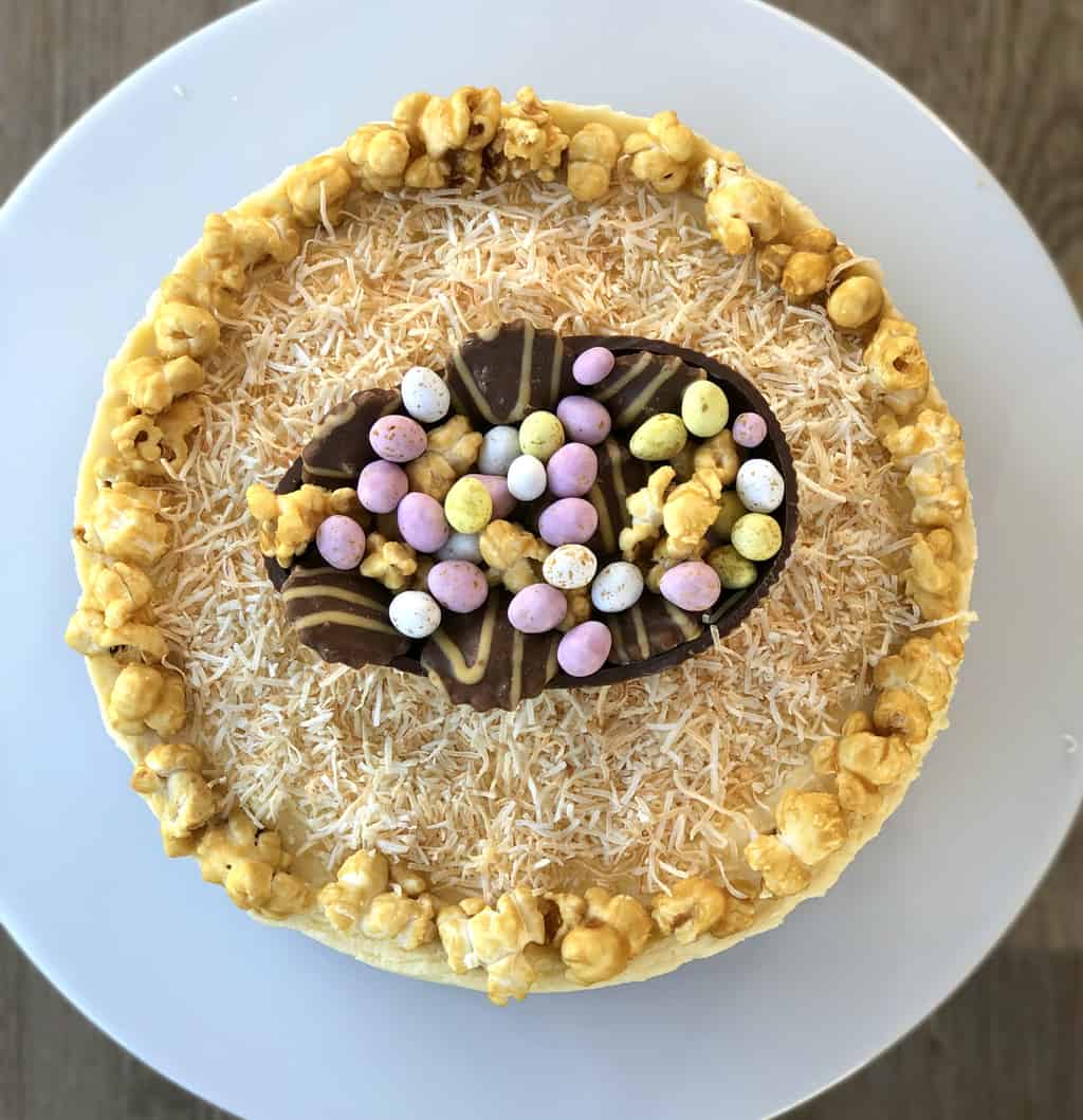 top view of a Toasted Coconut White Chocolate Cheesecake with Maple Syrup Popcorn