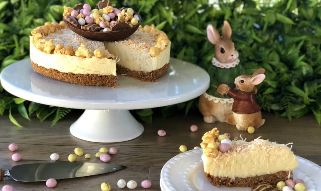 Slice of White Chocolate Coconut Cheesecake with Easter Toppings 