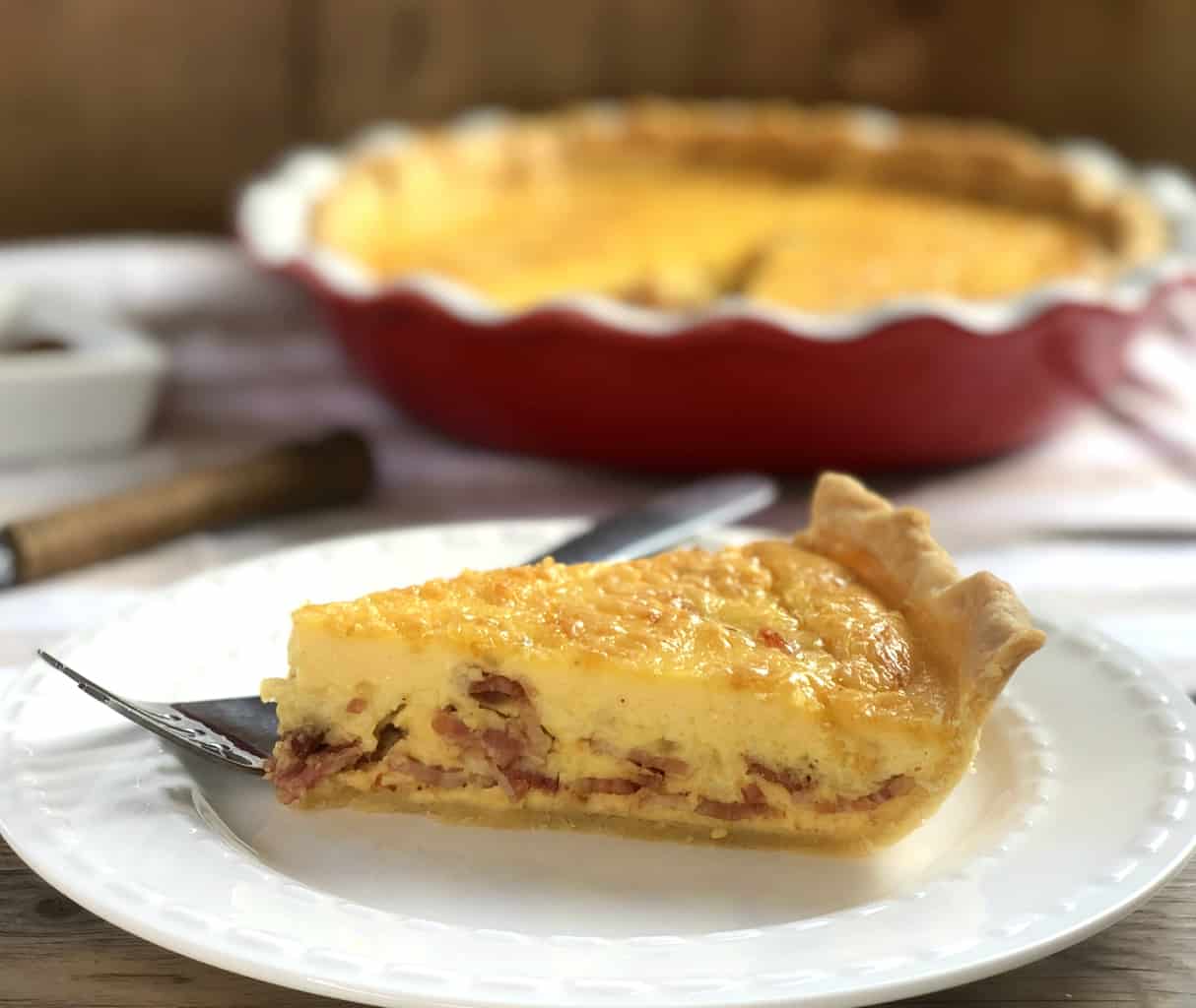 Slice of Bacon Quiche with Egg & Cheese