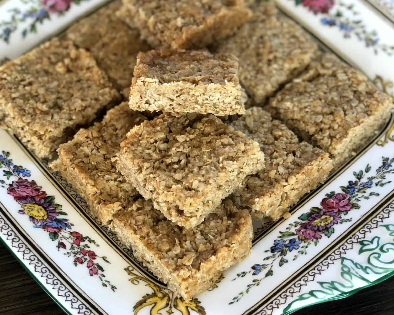 Close up photo of squares of rolled oat crunch slice 