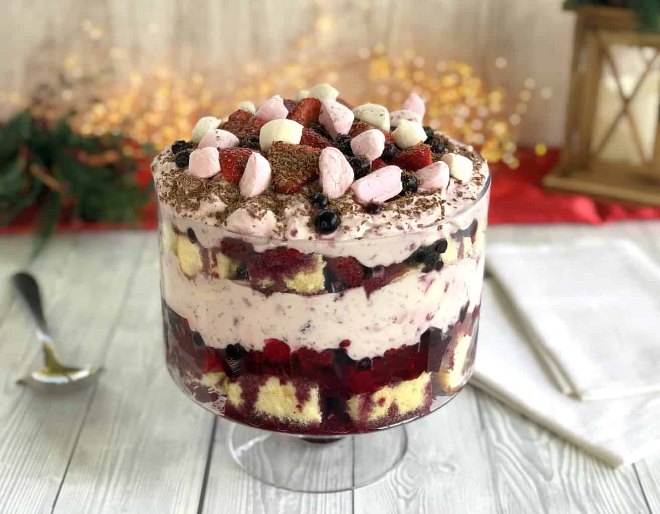 Bowl of Ambrosia Trifle, with festive decorations