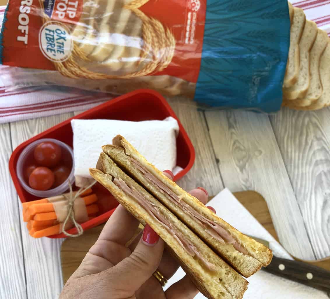 Sliced cooled toasted sandwiches and a loaf of Tip Top Bread 