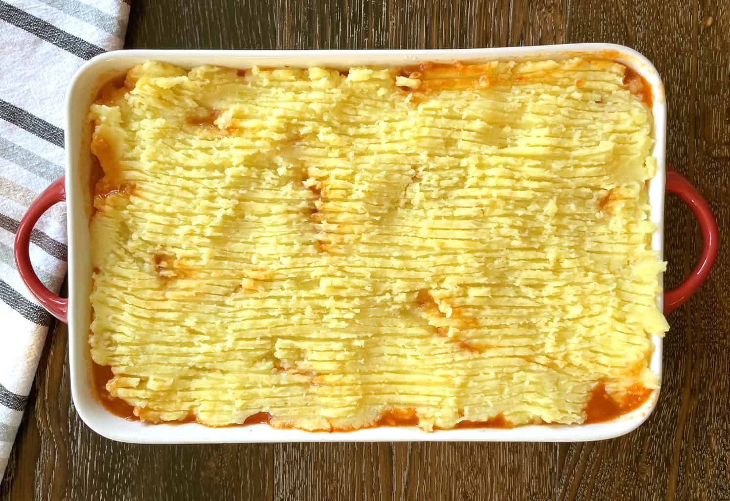 Use a fork to create lines on the shepherds pie to create a golden crust 