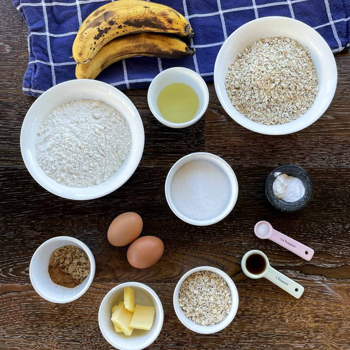Overhead photo of the ingredients used to make banana oat muffins - see recipe card for details