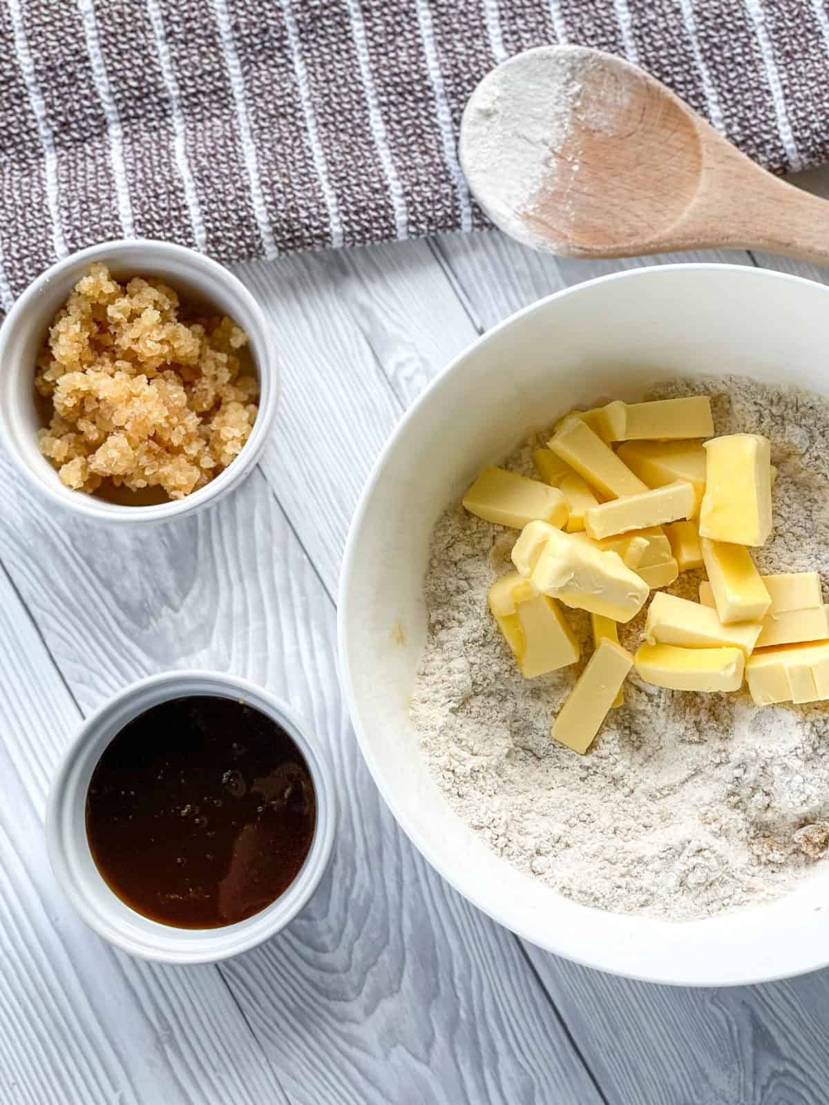 Process shot of rubbing the butter into the flour mixture. 