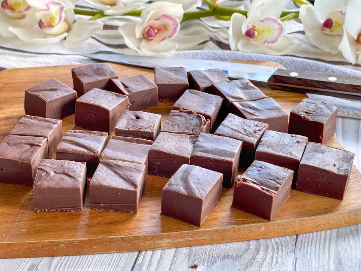 Pieces of chocolate fudge on a chopping board 