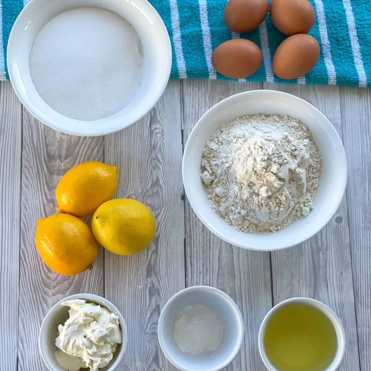 Ingredients used in making lemon syrup cake, see the recipe card for full details