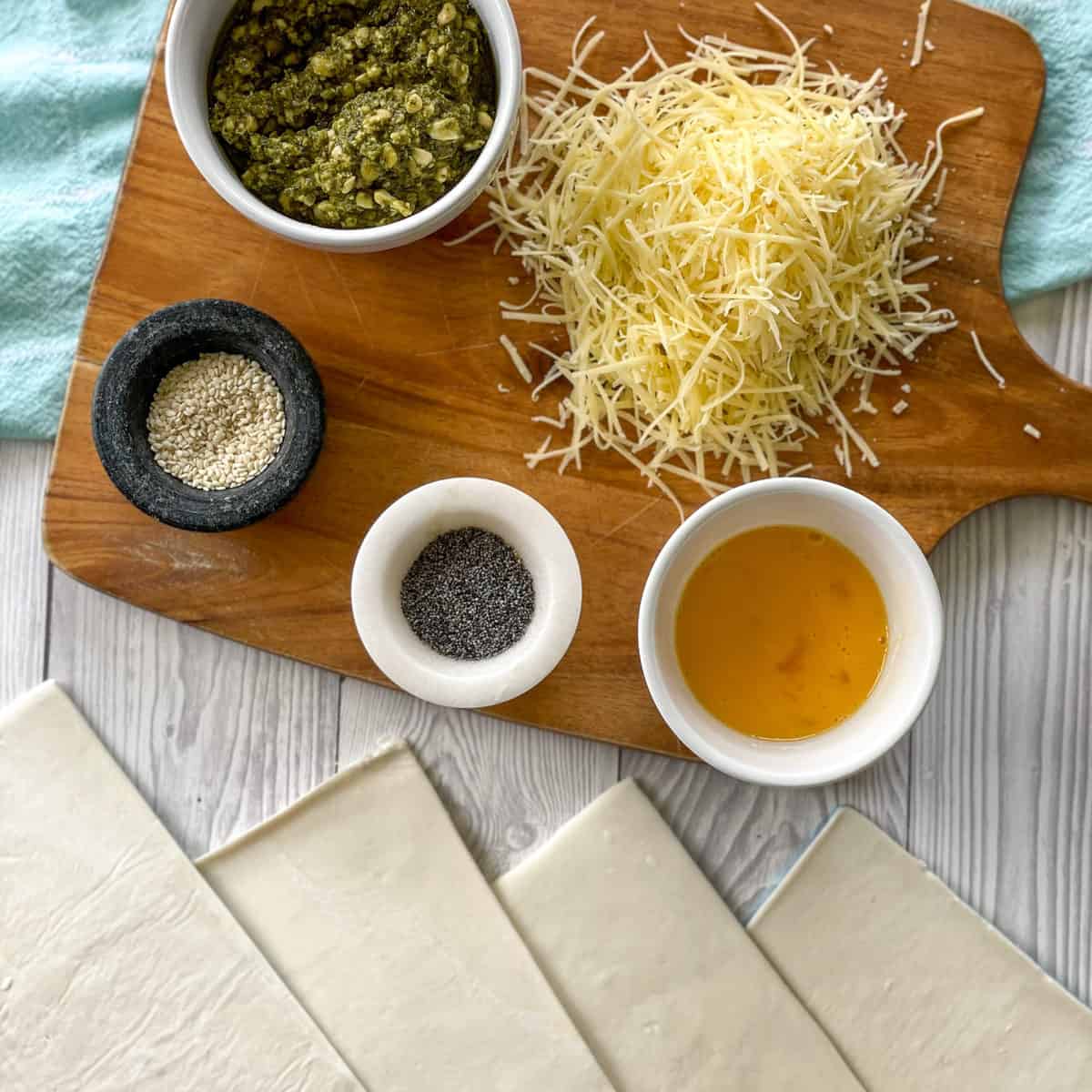 Pesto, seeds, parmesan and puff pastry with an egg wash 