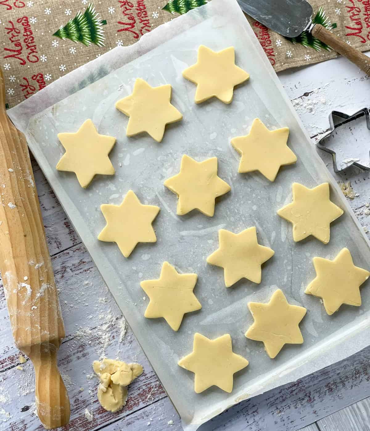 Shortbread cut into star shapes ready to be baked 