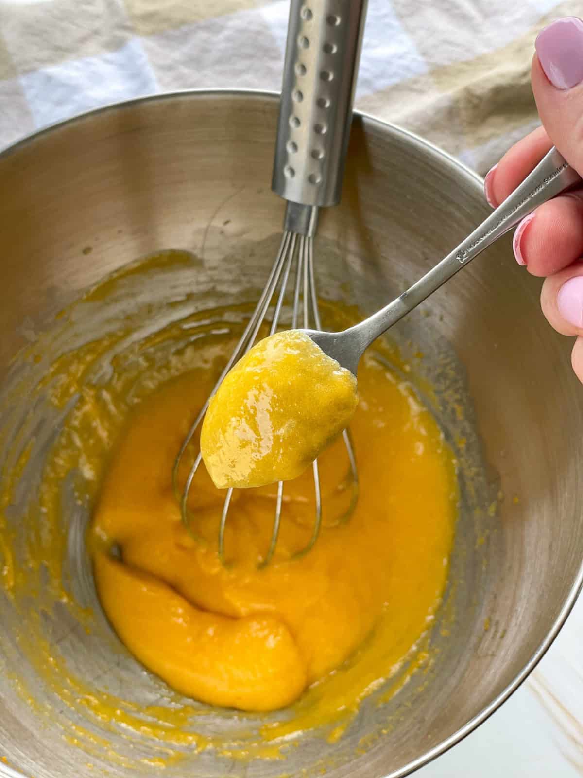 Lemon curd should coat the back of the spoon when the right consistency 