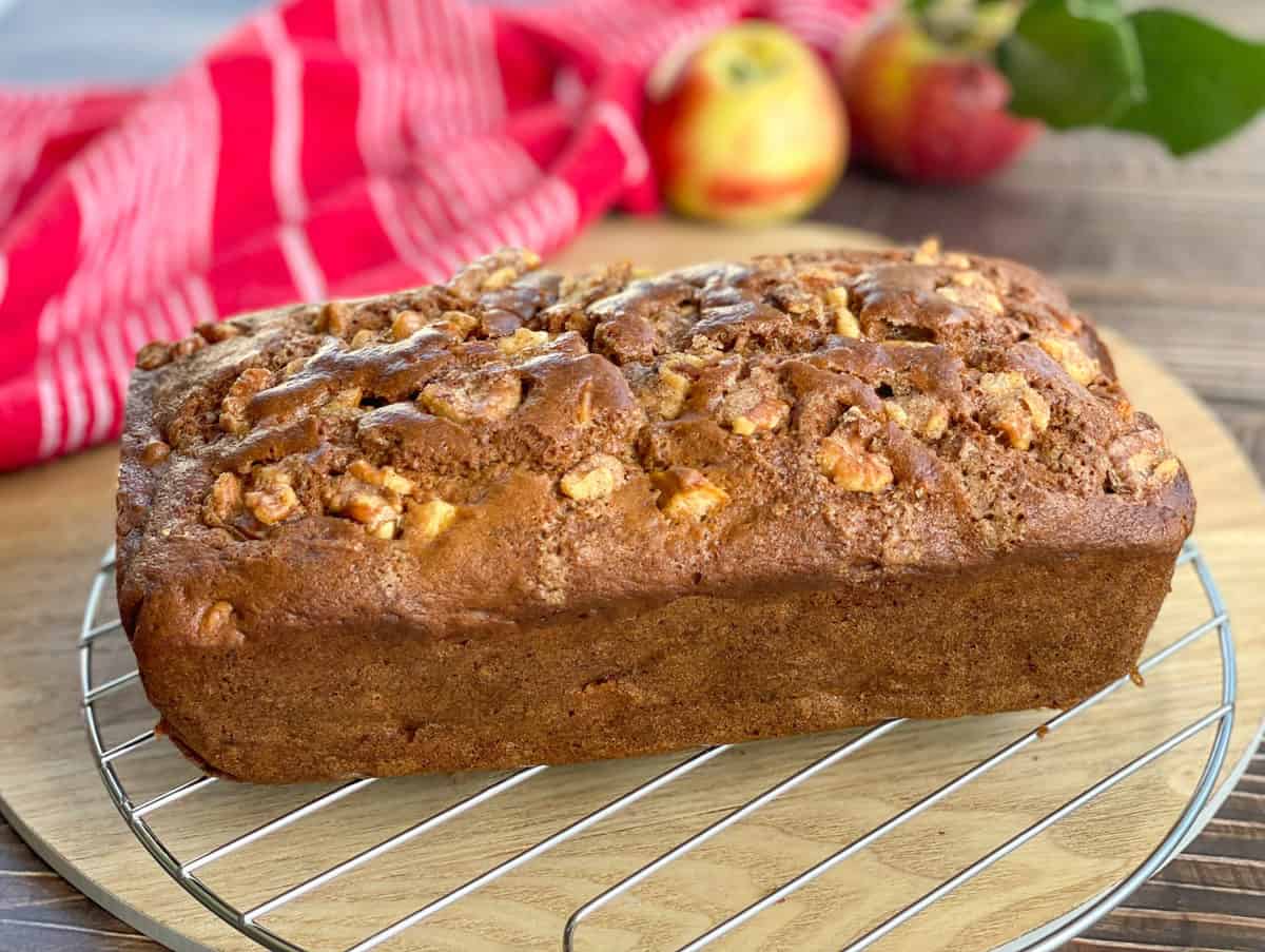 Apple and walnut loaf cooling on a wire rack 