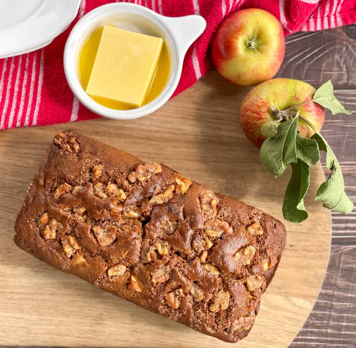 Overhead view of apple and walnut loaf with sugared walnut topping 