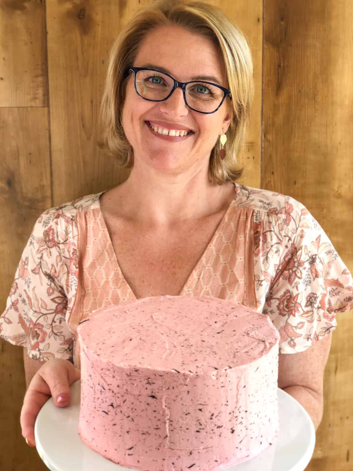 Anna from Just A Mum holding her Easter Speckle Mudcake