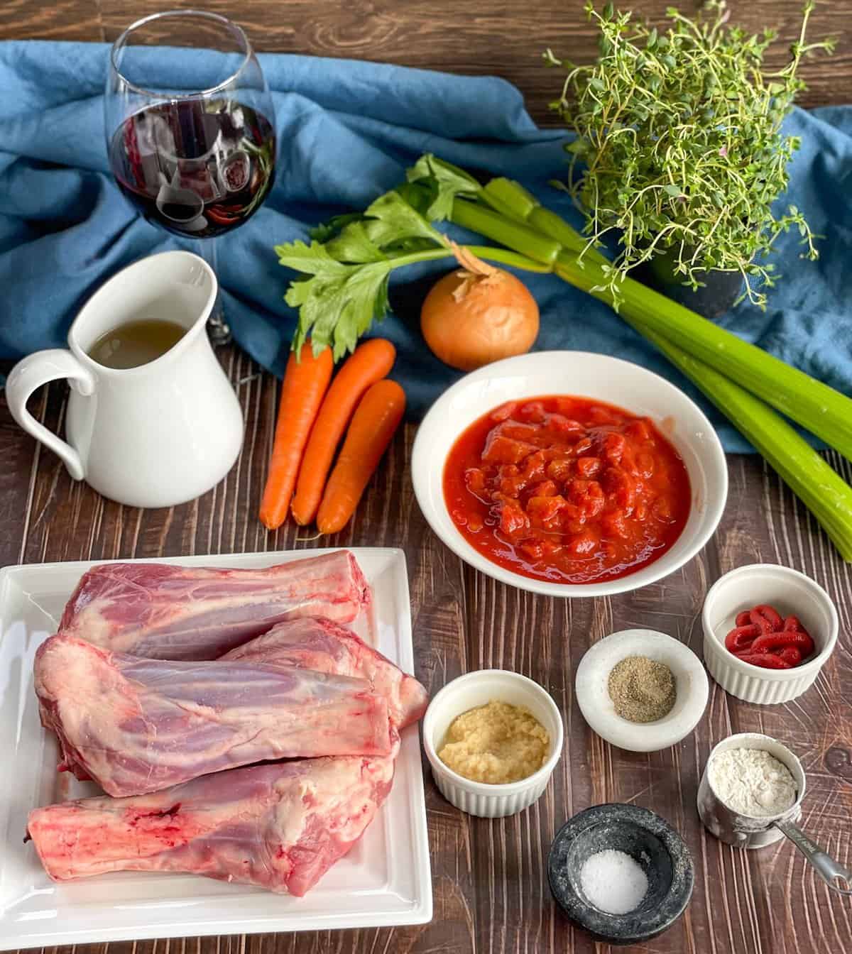 Ingredients to make Lamb Shanks in Red Wine Sauce - see recipe card for full details 