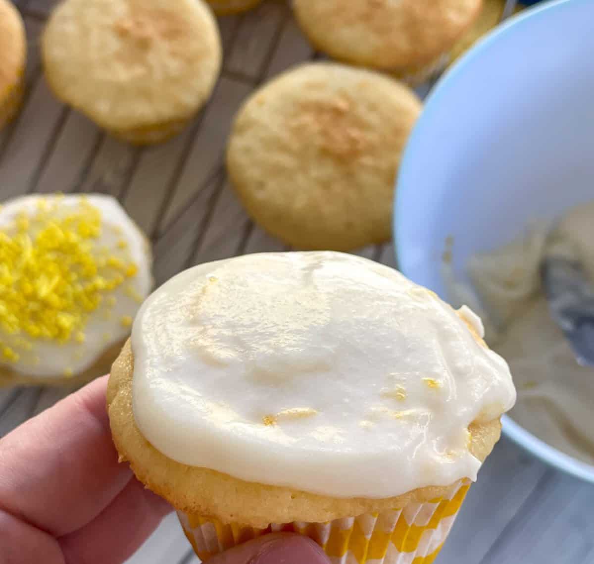 Basic white lemon icing on a lemon cupcake