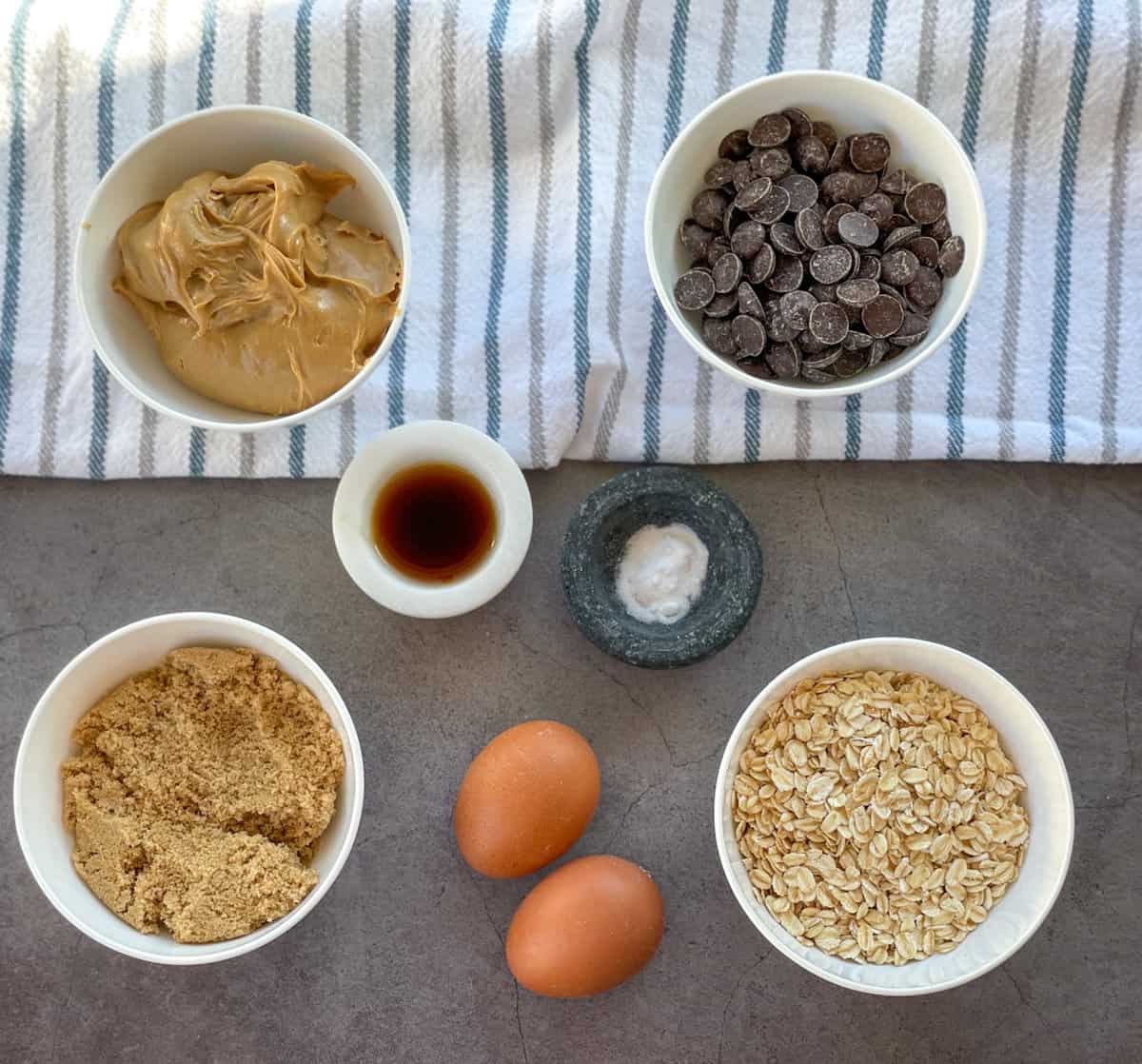 Ingredients for Flourless Peanut Butter Cookies with rolled oats and chocolate 