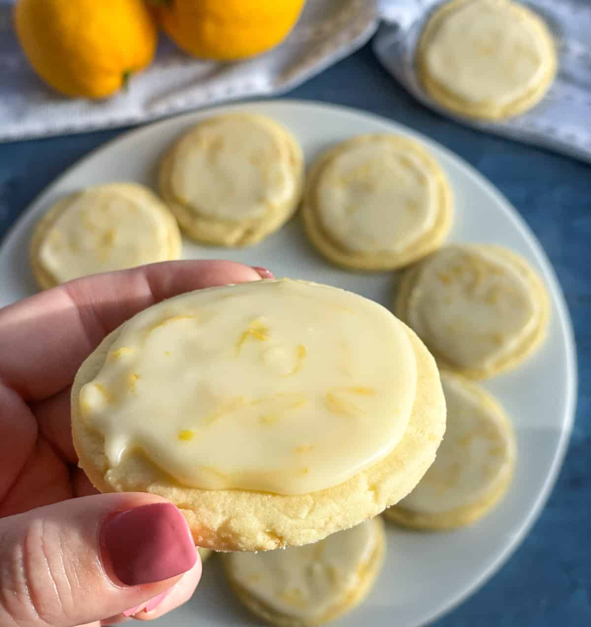 Hand holding a lemon shortbread cookie 