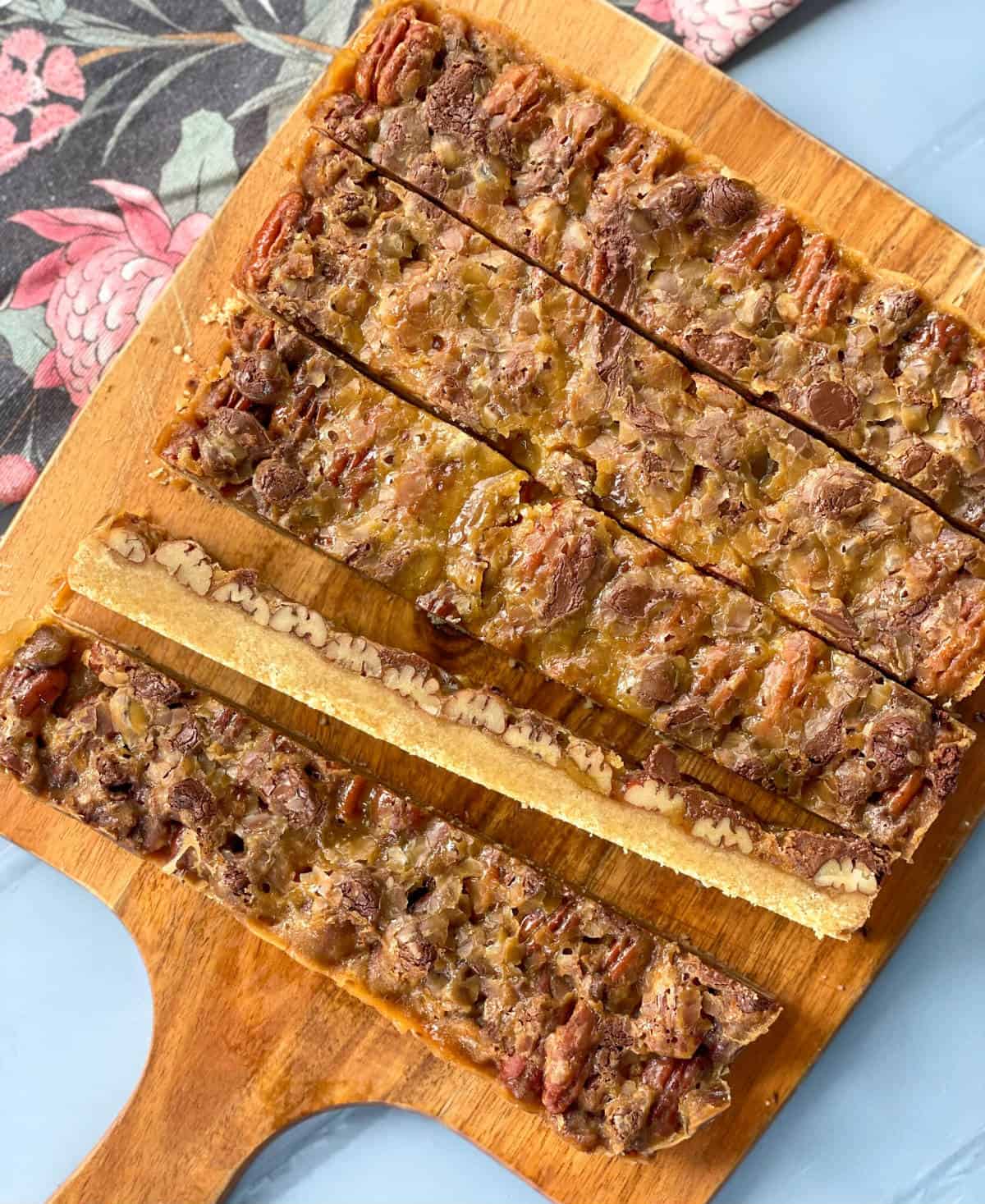 A whole pecan caramel slice, cut into strips