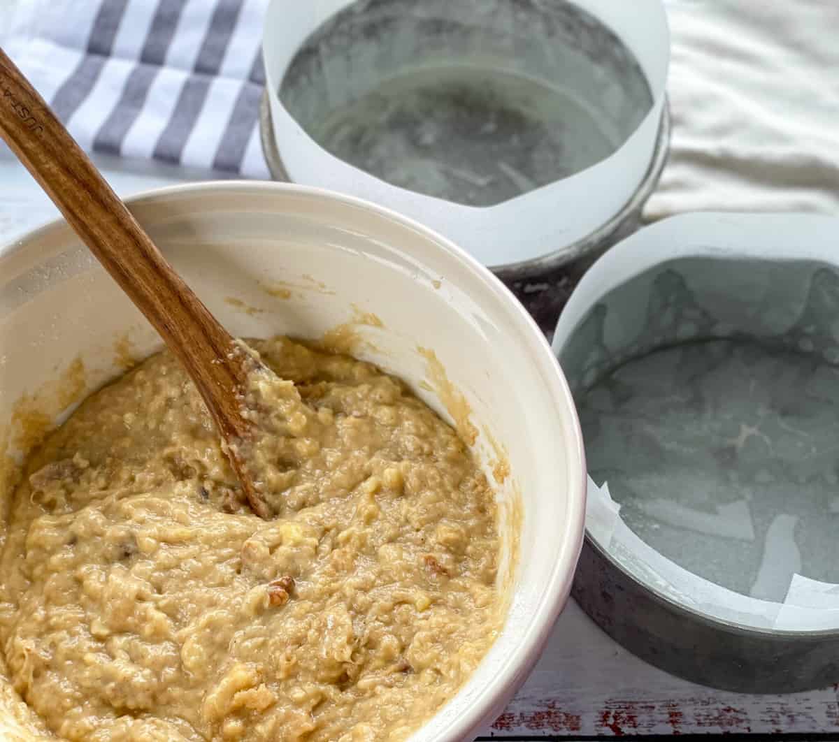 Hummingbird cake batter ready to go into two lined tins. 