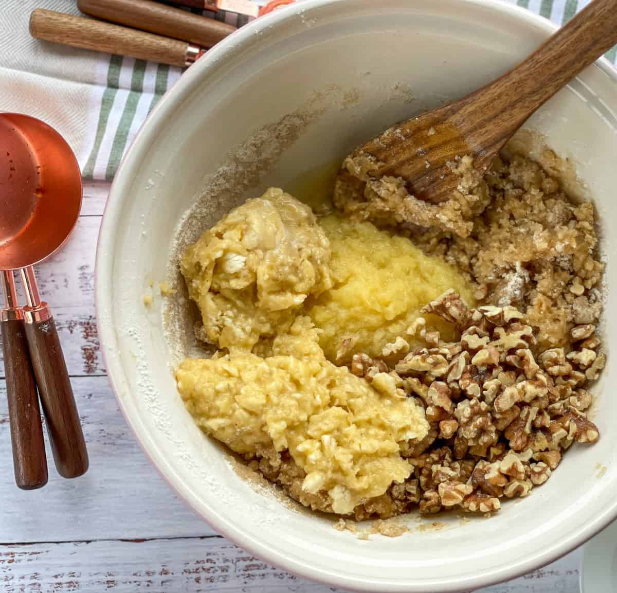 Adding the walnuts, banana and pineapple to the humminbird cake