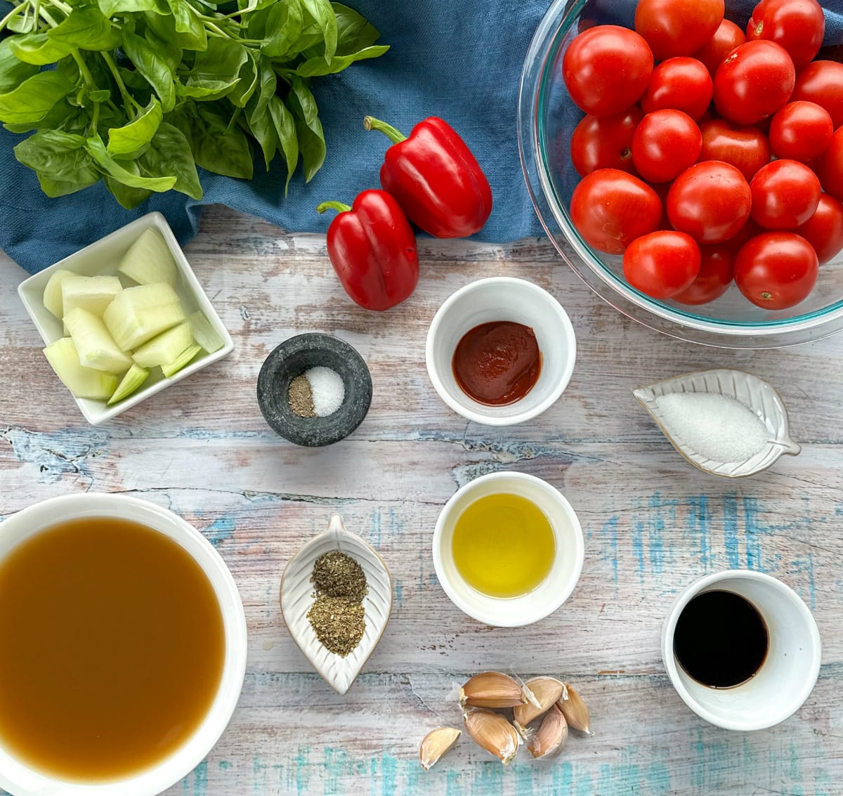 Showing the ingredients used to make the tomato soup, see recipe card for the full list