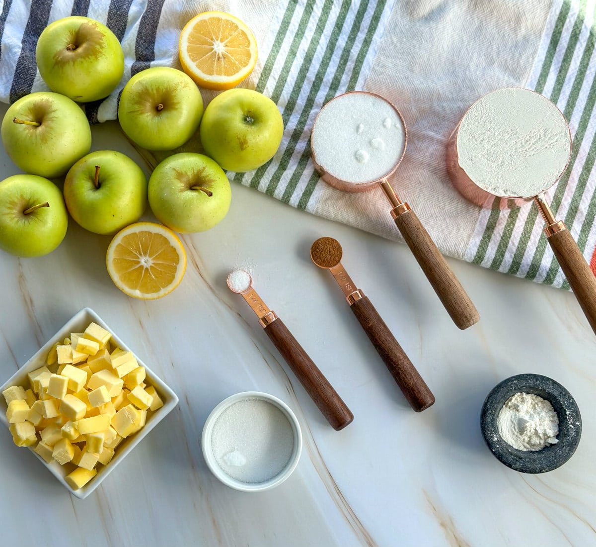 Ingredients required to make an apple crumble, see the recipe card for full details