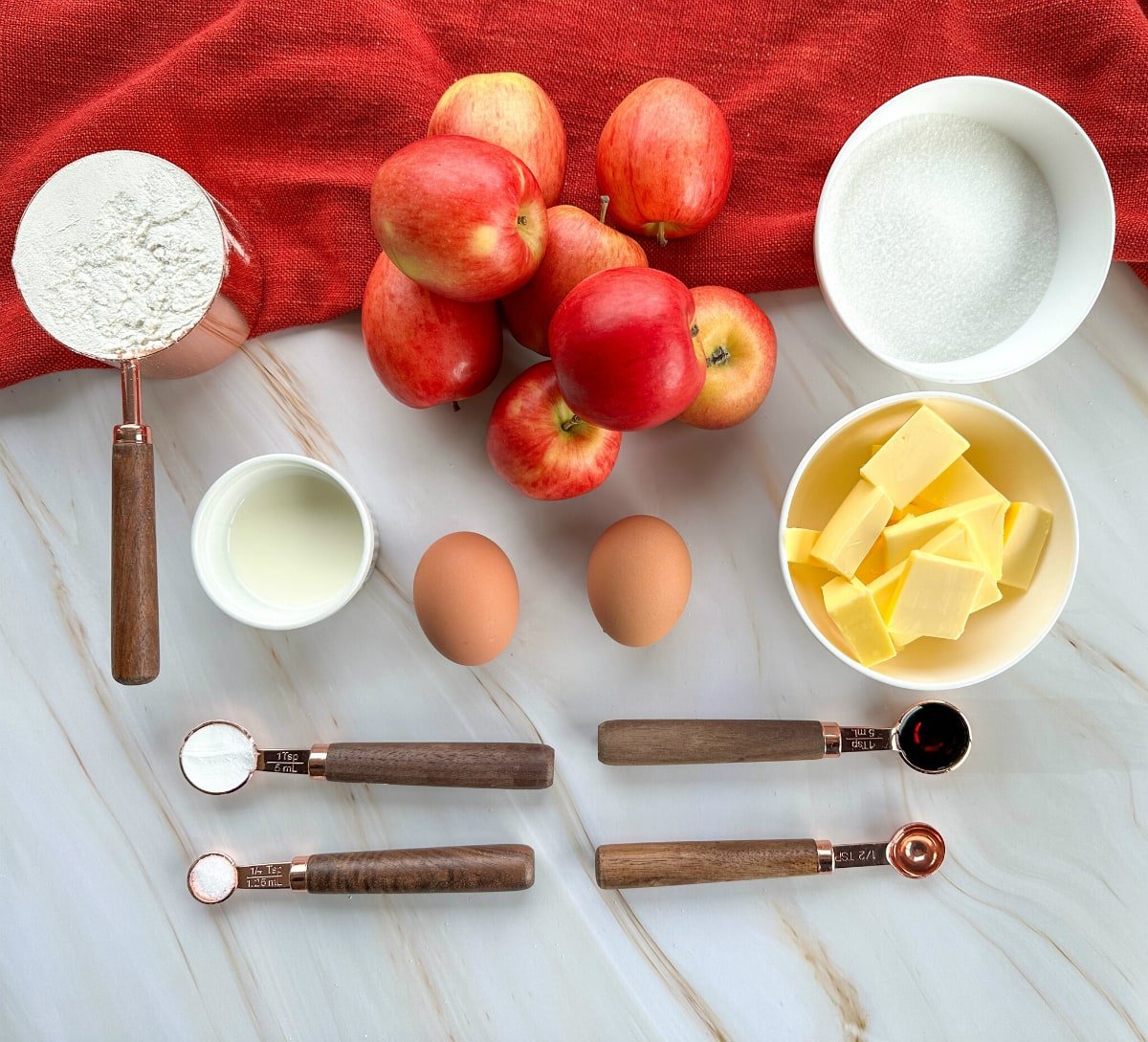 Ingredients used to make a french apple cake - see recipe card for full details 