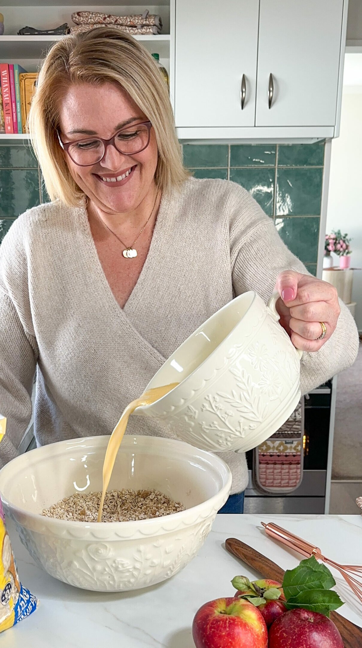 Pouring wet ingredients into try ingredients 