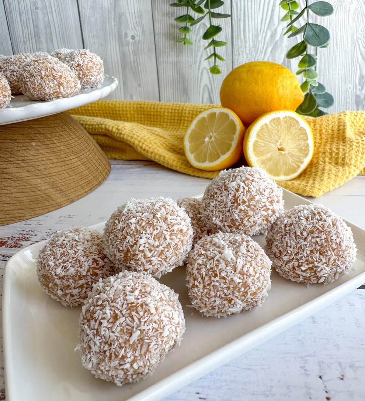 Lemon and Coconut Truffles, made with biscuits, condensed milk and fresh lemons. Sweet treat, balls rolled in coconut 