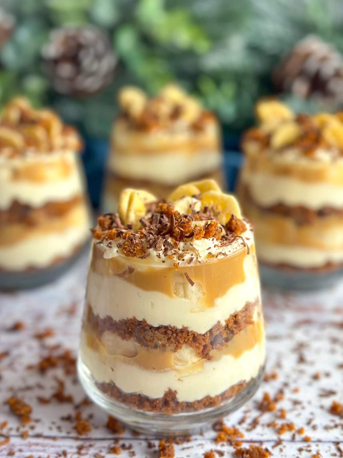 Layered individual servings of banoffee trifle desserts