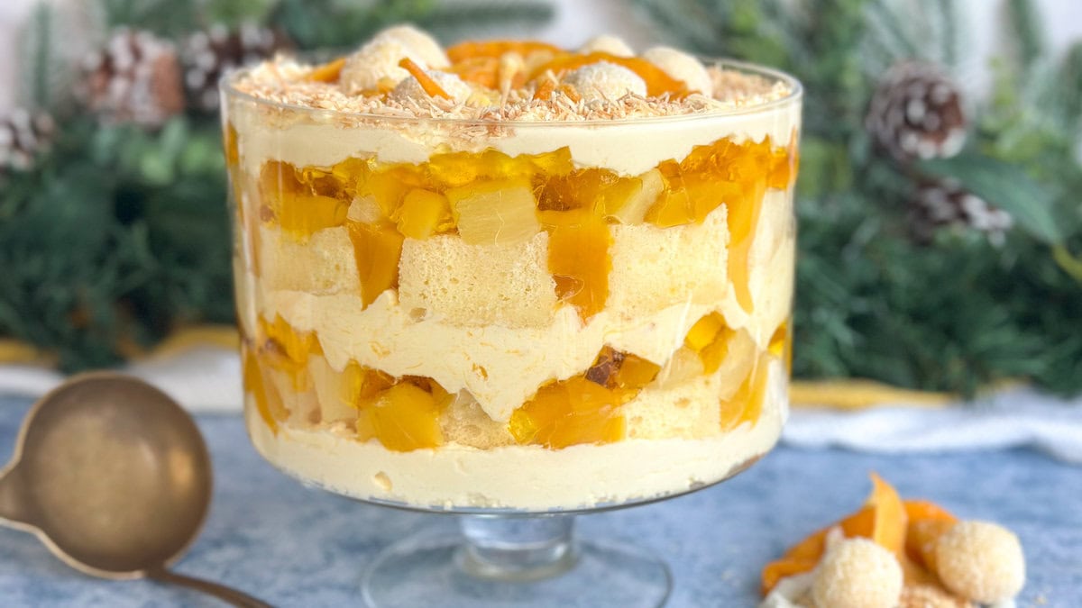 Large tropical coconut trifle in a glass bowl