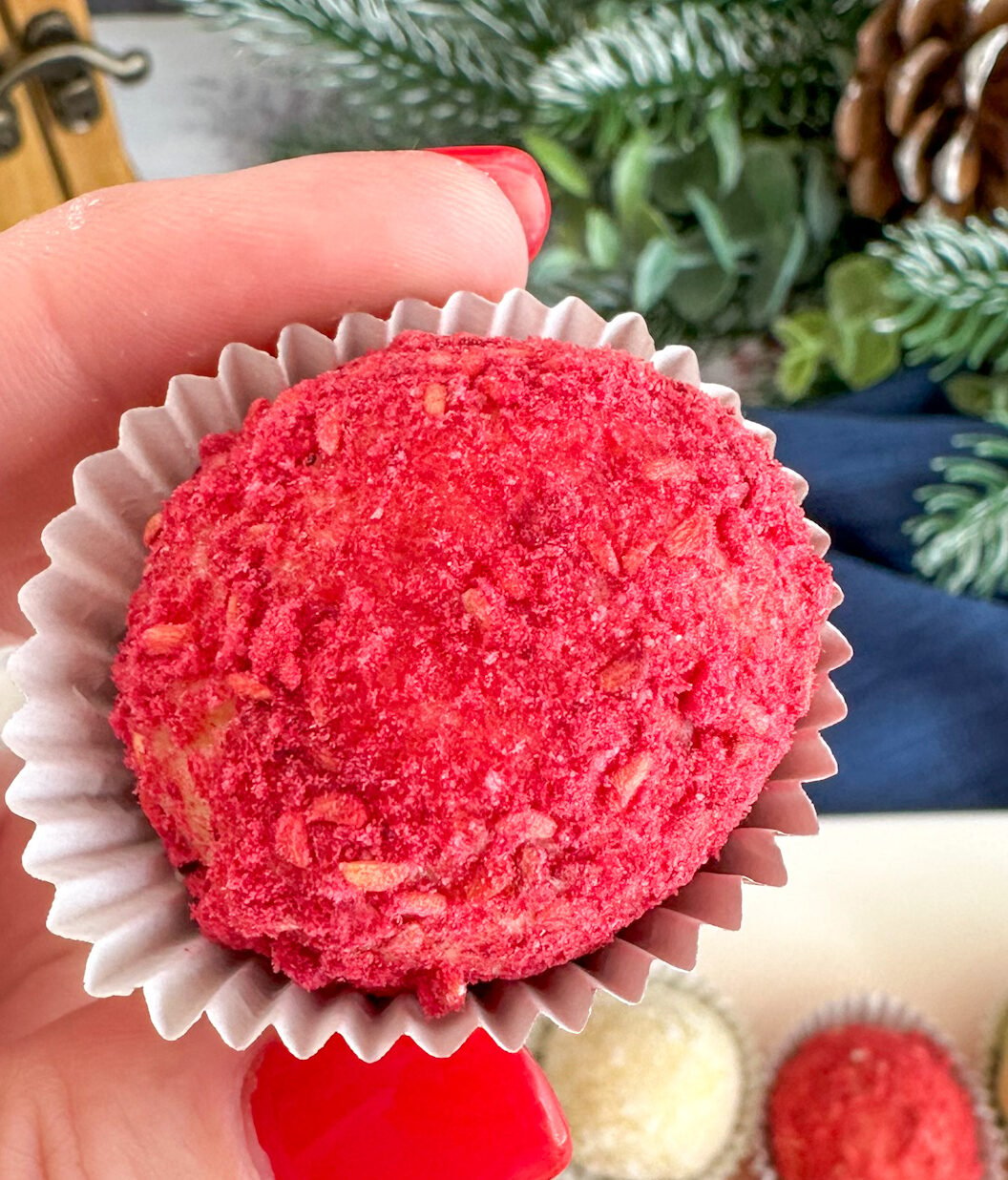 White truffle rolled in crushed freeze dried raspberries 