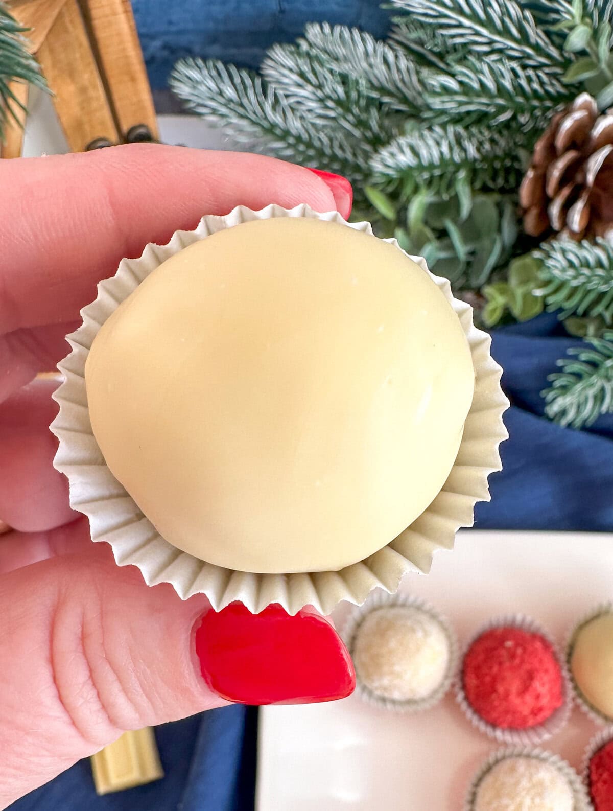 White chocolate truffle coated in melted white chocolate 