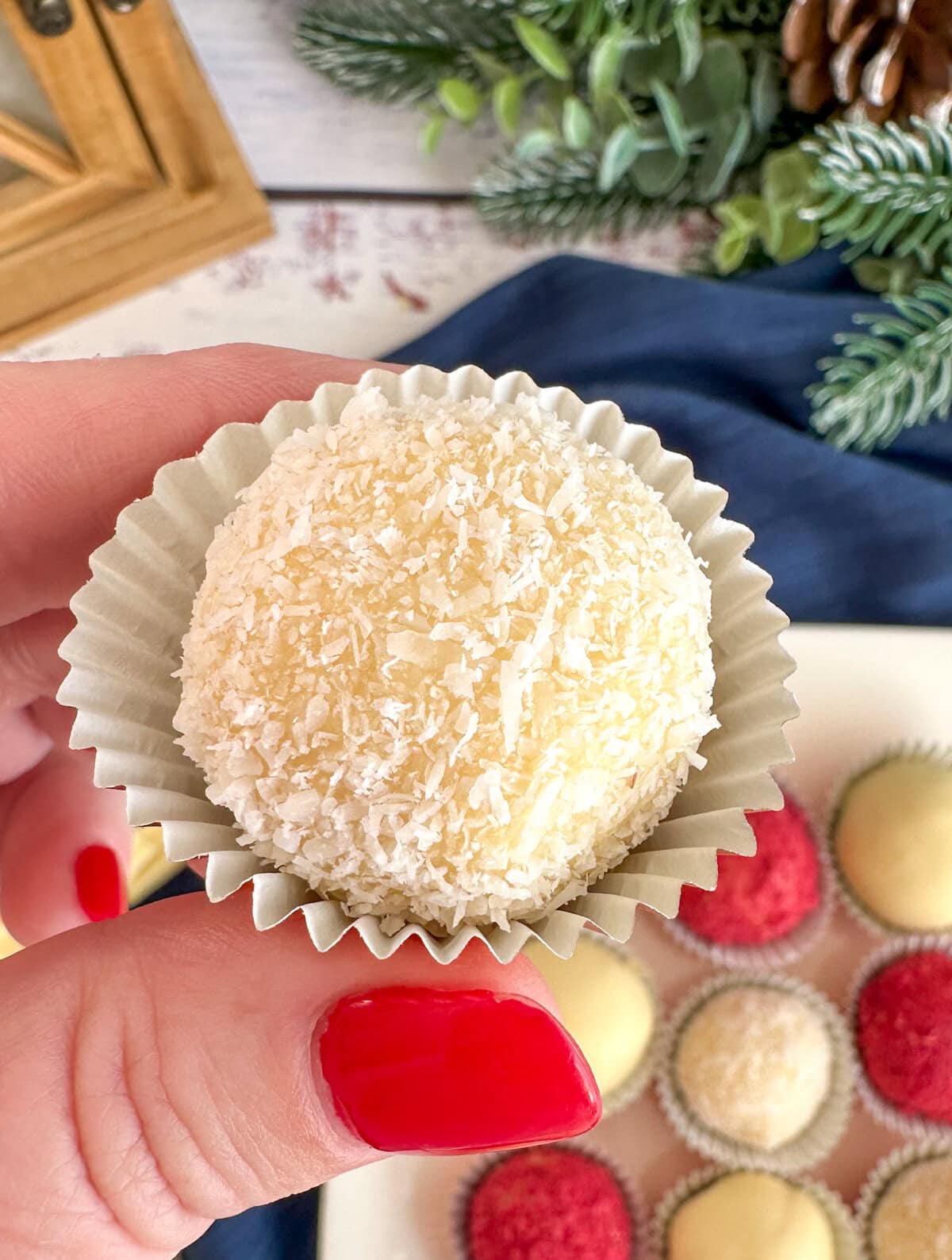 White chocolate truffle coated in finely desiccated coconut 