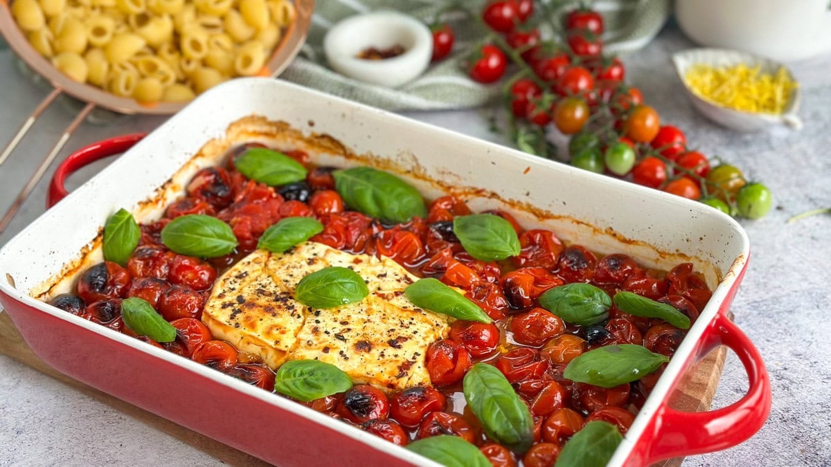 Baked Feta with charred cherry tomatoes, pasta and lemon zest